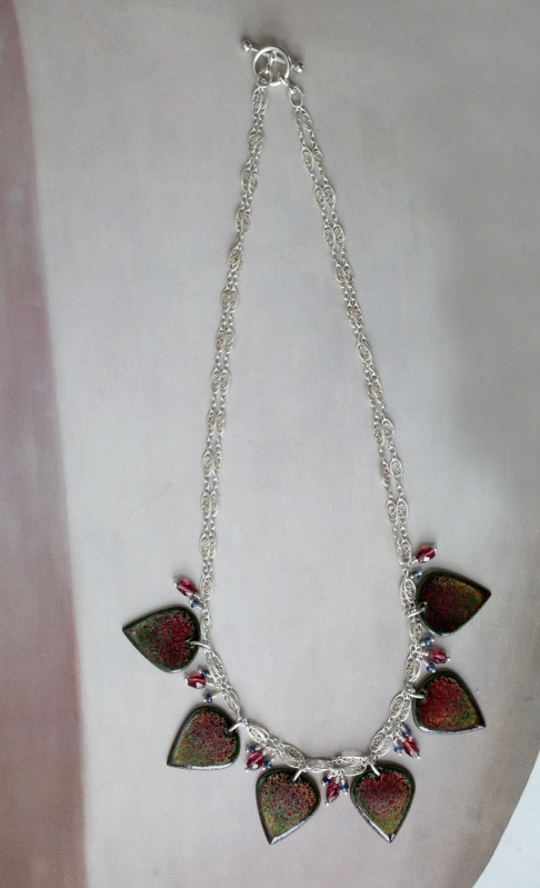 Sapphire and Garnet Leaf Necklace / reversible by Catherine DeYoung | Vitreous enamel on copper. Double strand filigree sterling silver chain with multiple natural gemsto Sapphire and Garnet Leaf Necklace / reversible